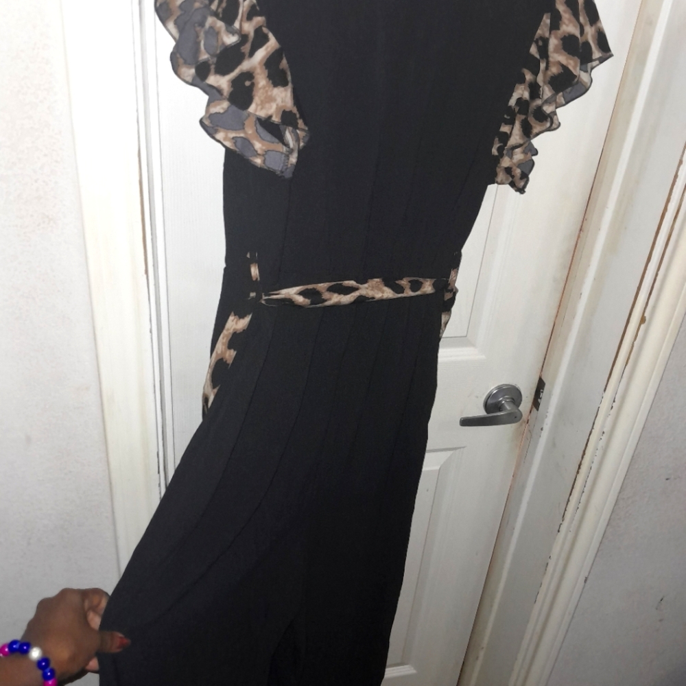 Black Jump Suit with cheata sleeves and belt size 14/16 runs big